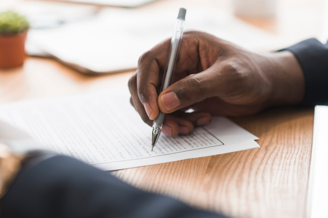 Person writing details